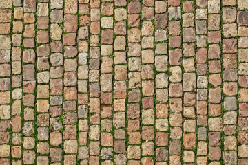 Closeup view of a tile ewalk. The pavement consists of cubes of stone. JPEG and RAW.