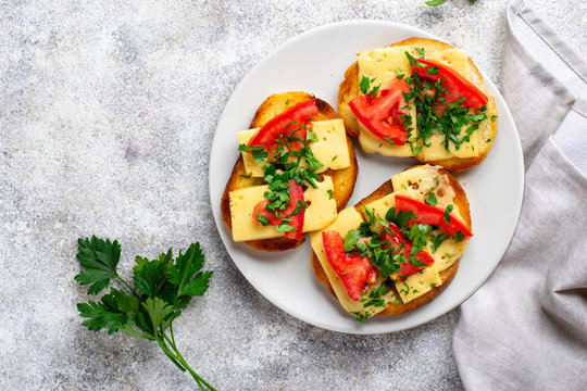 Grilled toast with tomato and cheese