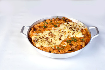 Sausage Risotto, Italian risotto served with Italian sausage and onion pepper mix ,tossing in spicy tomato sauce topped with parmesan cheese