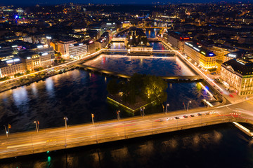 Fototapeta na wymiar Aerial night view of Geneva city waterfront skyline in Switzerland