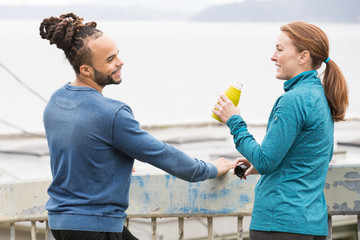 Healthy couple working out together outside