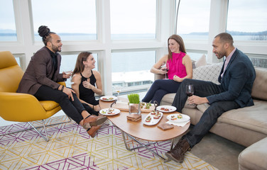 Group of people together at a cocktail party
