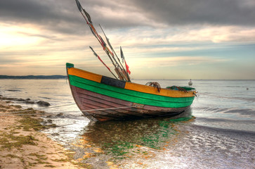 Naklejka na ściany i meble HDR fishing boat on the beach in Poland