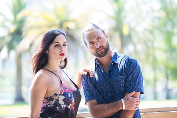 Obraz premium Young attractive couple together outside