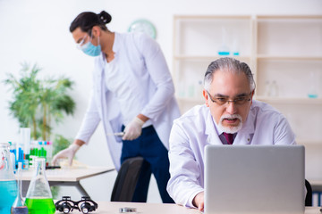 Fototapeta premium Two chemists working in the lab
