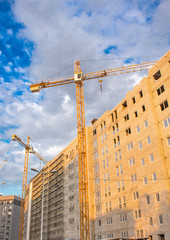 construction tower cranes are on the construction site