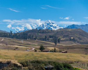 Sacred Valley, Peru - 05/21/2019: The inescapable snow peaked Andes mountains in the Sacred Valley of Peru.