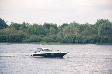 Fototapeta na wymiar Speedboat on the river
