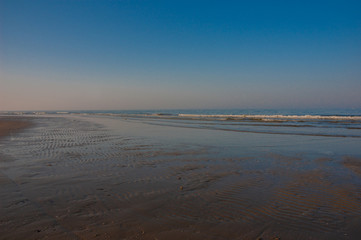 Lonely sunset beach in Rimini