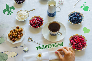 Obraz na płótnie Canvas Vegetarian snack. Frozen berries, cream, female hand and coffee. Double exposure