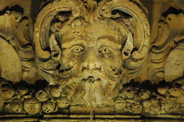 Fototapeta na wymiar Bas-relief retro decorative art in an old vestibule