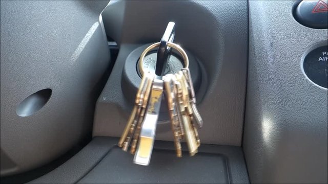 keys swinging in vehicle ignition