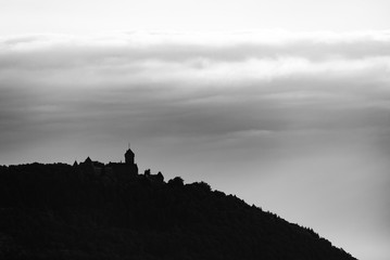 silhouette of castle on top of the hill