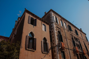 Old european street in summer. Warm light