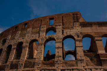 Roman coliseum with bird flying