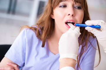 Young patient visiting doctor otolaryngologist