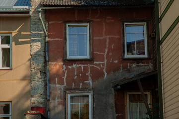 Fototapeta na wymiar Euripean window in an old stone house