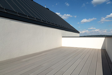 Luxurious modern house in a developer standard. Composite deck terrace and graphite sheet metal...