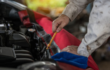 Auto mechanic service Check engine oil
