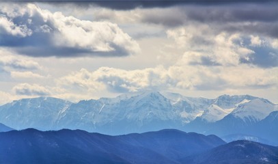 Fototapeta na wymiar Bucegi mountains with snow-capped peak