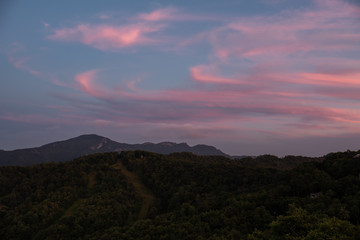 Grandfather Mountain against a beautiful blue pink and red sunset
