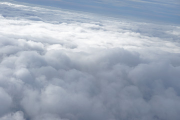 Fototapeta na wymiar View Clouds through the plane window