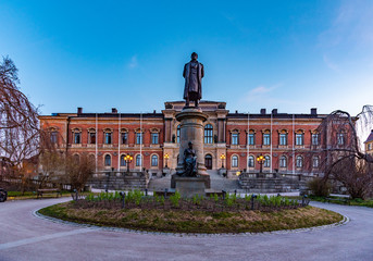 Sunset view of Statue of Erik Gustaf Geijer in front of the university of Uppsala in Sweden