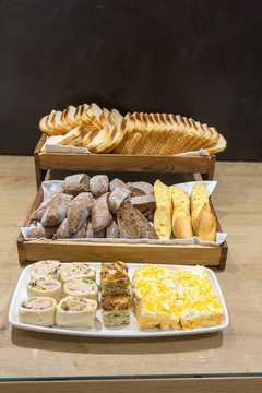 Various types of bread on hotel buffet table