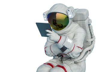 astronaut  fiddling with the tablet - obrazy, fototapety, plakaty