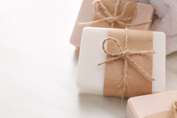 Soap bars on light background, closeup