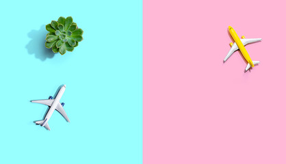 Travel theme with miniature airplane from above