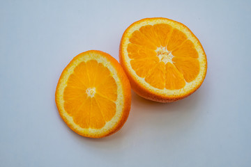 Cut orange, orange slice isolated on white background