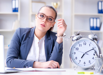 Businesswoman in time management concept