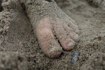 foot in sand