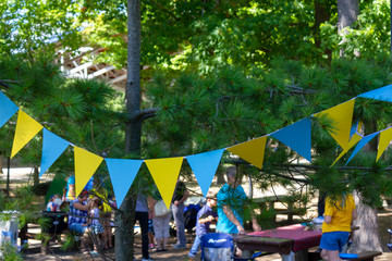 Ottawa, Canada - August 26,2019 - swedish ukranian picnic barbeque party in the canadian park during the independence day in summer