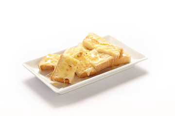 Thai Baked Toast with milk and sugar on white plate.