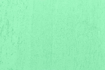 Mint color stucco close-up. Plaster wall. interior decor.