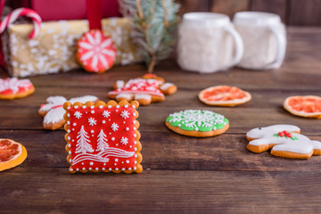 Christmas homemade gingerbread cookies on wooden table. It can be used as a background