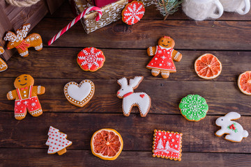 Christmas homemade gingerbread cookies on wooden table. It can be used as a background