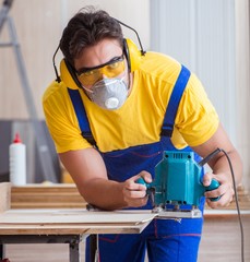 Fototapeta premium Carpenter working in the workshop