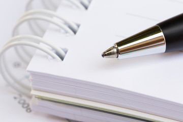 Close up of pen and notebook, Business Background