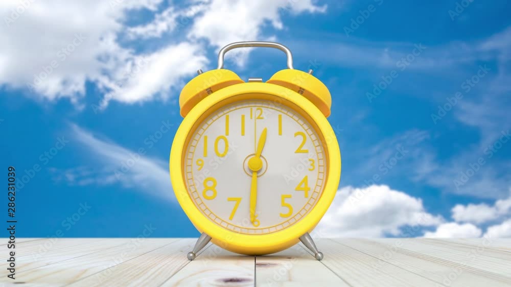 Poster yellow clock on table and sky time lapse on the bright sky. minimal and break time idea concept. the
