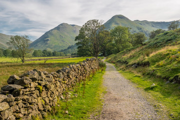 Hikking between Brotherswater and Angle Tarn near Patterdale in the English Lake Districr surrounded by many Wainwrights