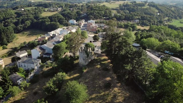 Aerial view of Sarria, Spanish town along Camino de Santiago or Way of St. James. Landscape in Spain seen from drone flying in sky