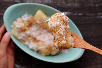 close up cassava steaming with coconut milk, sesame