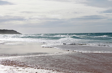 More wave action on Lake Tyers beach. Australia.