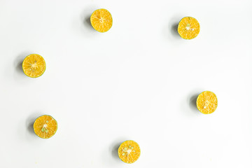 Top view, flat lay of fresh mandarin oranges on white background with copy space.