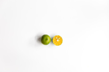 Top view, flat lay of fresh mandarin oranges on white background with copy space.