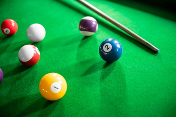 close up of snooker or billiard game on a table.