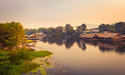 Fototapeta premium Sunrise over the river Kwai, Kanchanaburi, Thailand. Panorama